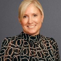 Janna Macmullin grey headshot